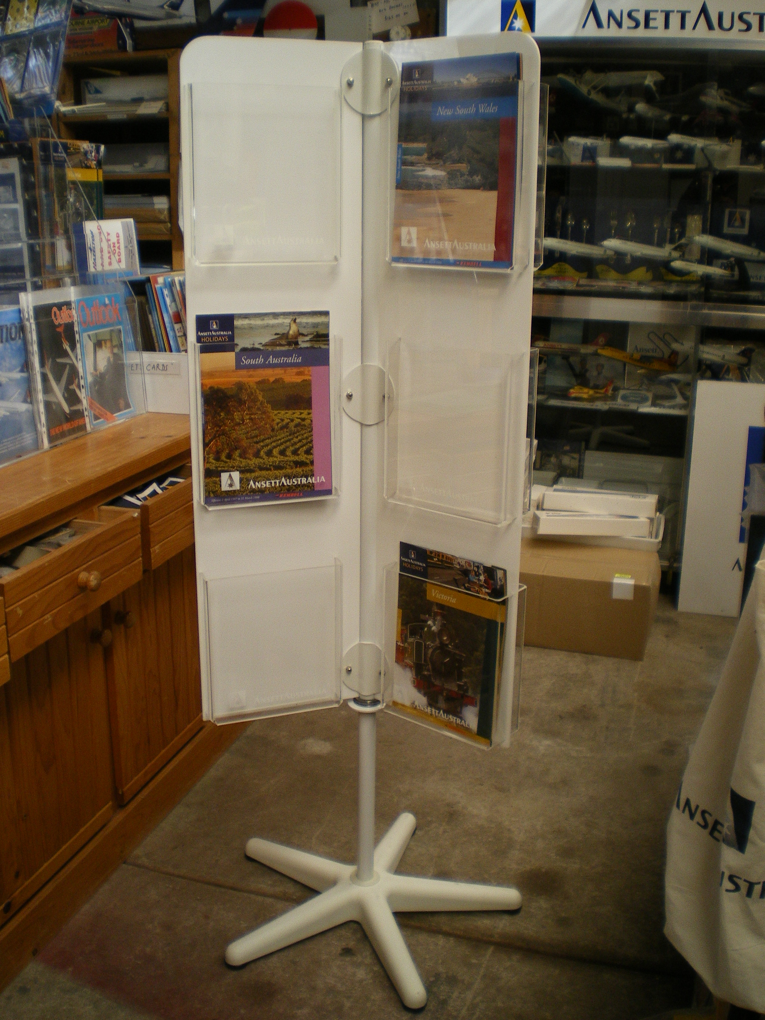 REVOLVING BROCHURE RACK REVOLVING BROCHURE RACK